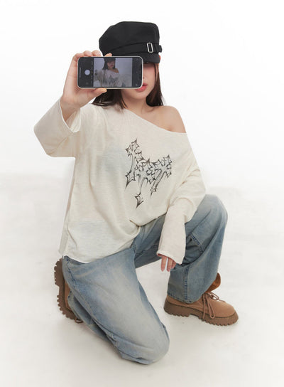 one-shoulder-sheer-long-sleeve-graphic-top-im528 / Light beige