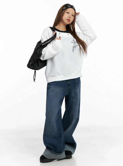 off-shoulder-eyelet-graphic-sweater-in528 / White