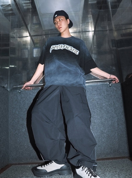 men-s-cargo-balloon-fit-windbreaker-pants-black-iu503