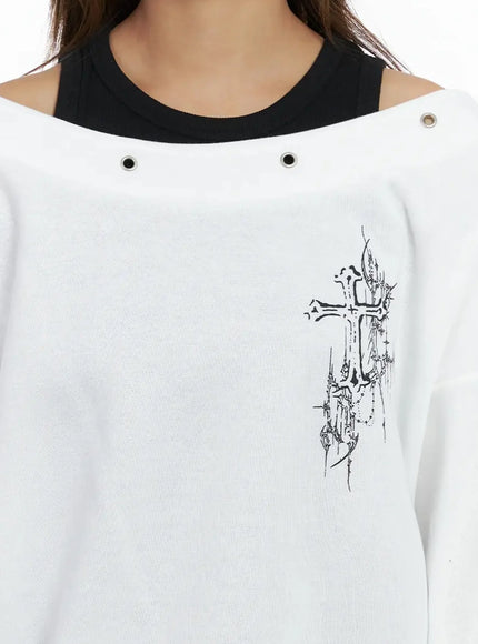 off-shoulder-eyelet-graphic-sweater-in528