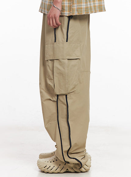 men-s-cargo-balloon-fit-windbreaker-pants-beige-iu512