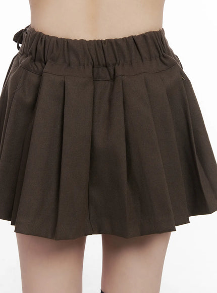 belt-detail-pleated-mini-skirt-cn510