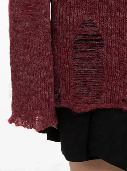 distressed-off-shoulder-sweater-in528