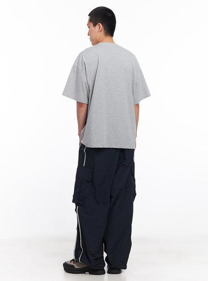 men-s-cargo-balloon-fit-windbreaker-pants-dark-blue-iu512
