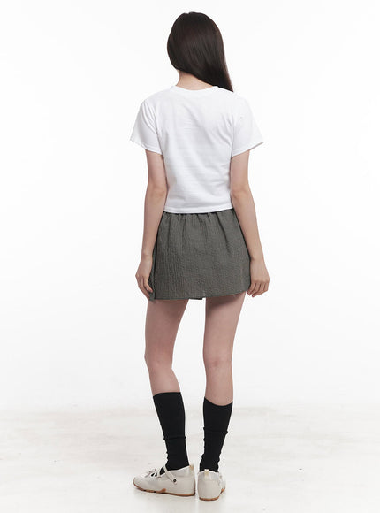 checkered-ribbon-button-mini-skirt-iy513