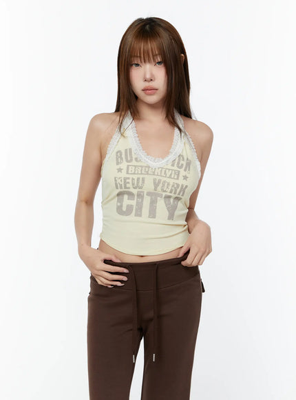 lace-trim-halter-graphic-tank-cy518