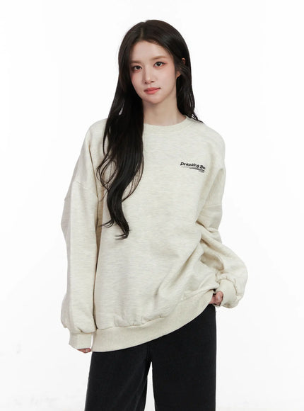 bear-graphic-oversized-sweatshirt-cn527 / Light beige